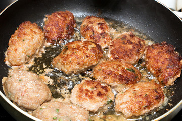cutlets fried in a pan