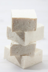Pile Raw cubic tofu made from soybeans 