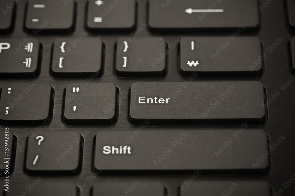 Fototapete Black keyboard computer to enter key 