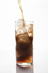 Cola Pouring to Glass with ice 