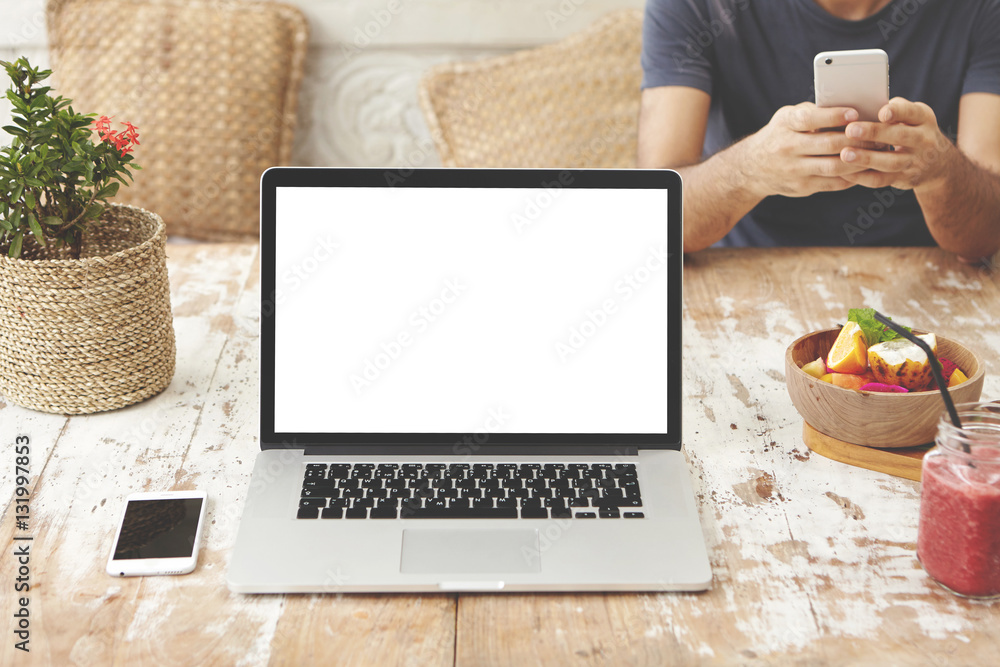 Poster modern technology, business and communication. workspace with open laptop pc, mobile phone and food 
