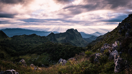 Fototapeta na wymiar Mountain with lighting and sunset sky . Doiluang chiangdao mountain in north of thailand