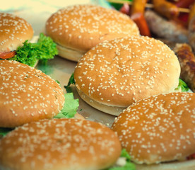 Hamburgers with salad and meat, street food. Selective focus