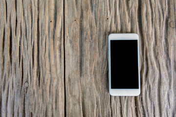 smartphone on wood table, smartphone