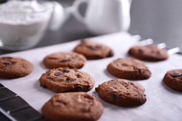 Freshly baked cookies on tray rack