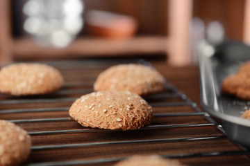 Freshly baked cookies on metal grid