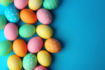 Colorful Easter eggs on blue background