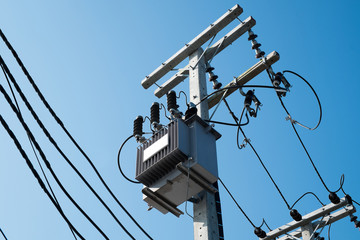 electric transformer in beautiful sky with clouds