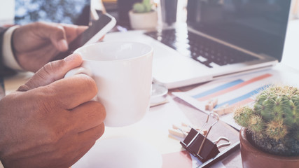 A business man working on the laptop at the office