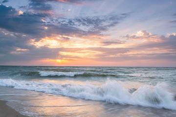 Fototapeta premium Landscape with Sunrise over Sea