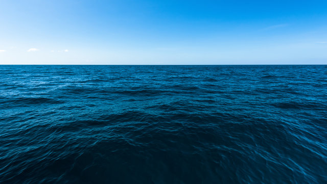 Fototapeta Dark deep ocean and blue sea, The vast sea with blue sky