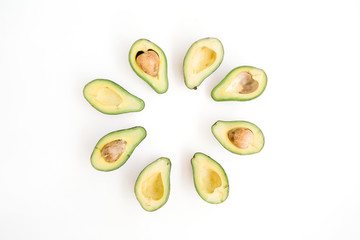 Sliced raw avocado arrangement. Flat lay, top view. Creative food concept