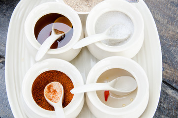 Unique Thai noodle garnish comprising sugar, fish sauce, vinegar