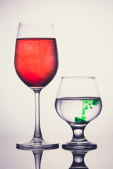 Wine glass There are two color red green , isolated on gray back