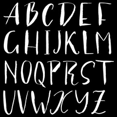 Hand drawn font made by dry brush strokes. Grunge style alphabet