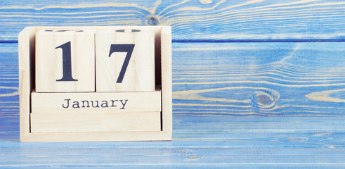 Vintage photo, January 17th. Date of 17 January on wooden cube calendar