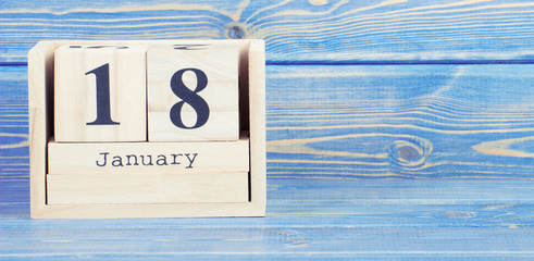 Vintage photo, January 18th. Date of 18 January on wooden cube calendar
