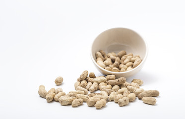 Boiled peanuts or groundnuts in a bowl isolated on white background.
