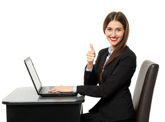 Businesswoman showing thumbs up sign