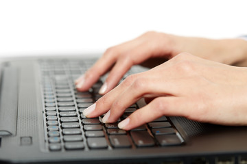 Woman typing on keyboard, closeup