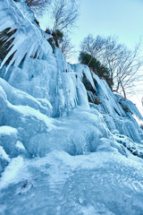 Frozen waterfall in the mountains