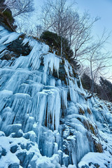 Frozen waterfall in the mountains