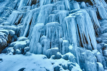 Frozen waterfall in the mountains