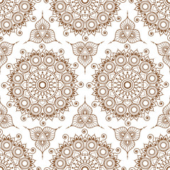 Background with brown and white mehndi henna seamless lace buta decoration items on white background in Indian style.