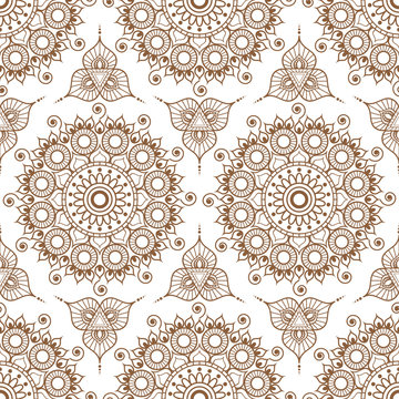 Background with brown and white mehndi henna seamless lace buta decoration items on white background in Indian style.