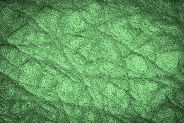 Green leather texture, leather background for design with copy space for text or image. Pattern of leather that occurs natural.