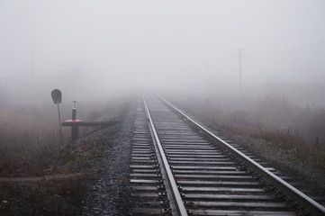 Rails in the fog.