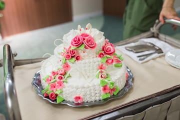 Wedding cake with red roses