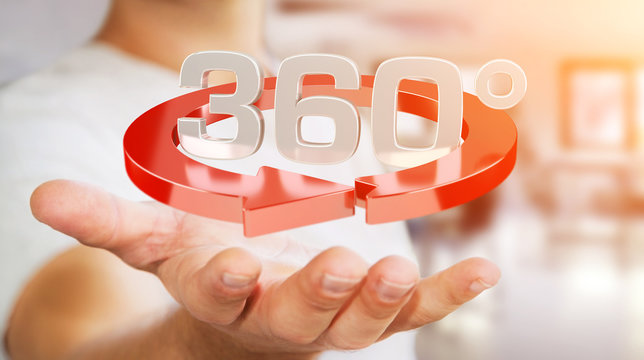 Man holding 360 degree 3D render icon in his han
