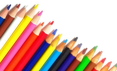 Color pencils on white background, copy space