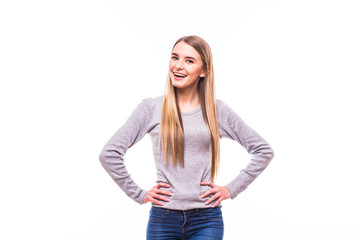 Young blonde girl, hands on shoulders, on white background