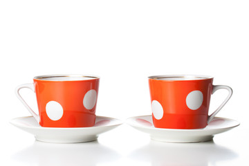 Tea cups  with saucers, red and white polka dots design
