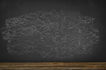 Black blank chalkboard texture with room for text or drawing