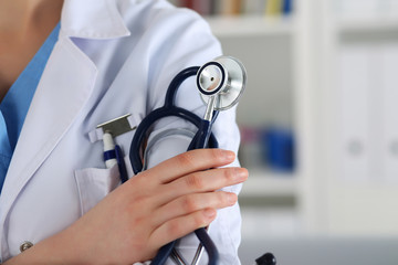 Closeup of female medicine therapeutist doctor hands