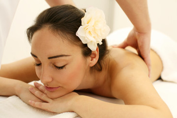 Woman enjoying a massage treatment.