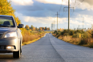 car on country road lane