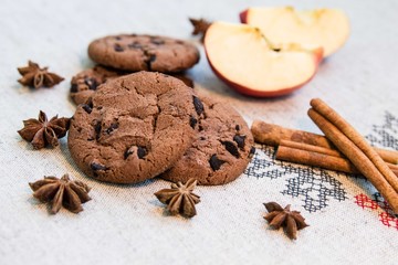 Fototapeta na wymiar Chocolate cookies with cinnamon, apple and anise