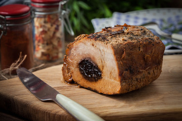 Delicious pork loin with plum.