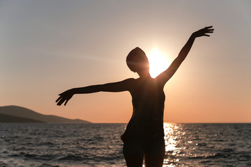 Fototapeta premium Woman enjoyment at the sunset in Turkey