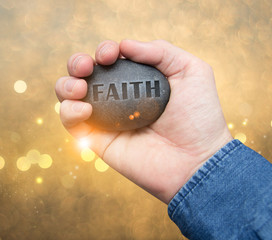 faith stone in hand