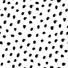 Seamless black and white vector free hand doodle texture with dots, dry brush ink art.