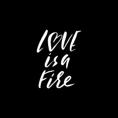 Hand lettered inspirational quote. Love is a fire. Hand brushed ink lettering. Modern brush calligraphy. Vector illustration.