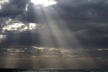 Very nice sunset , cloudy sky, sun ray in the sea of clouds