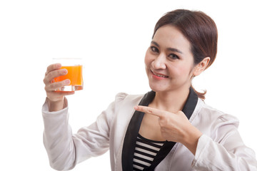 Young Asian woman point to orange juice.