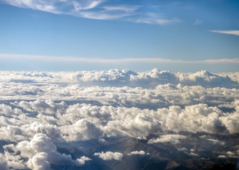 Fototapeta na wymiar Sky and clouds from a plane over Montenegro