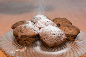 Chocolate muffin on wooden table
